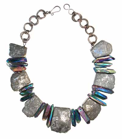 A reversible silver titanium quartz slabs necklace with large rainbow points