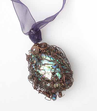 Oxidised Copper Wire Wrapped Paua Shell on an Organza Ribbon Pendant