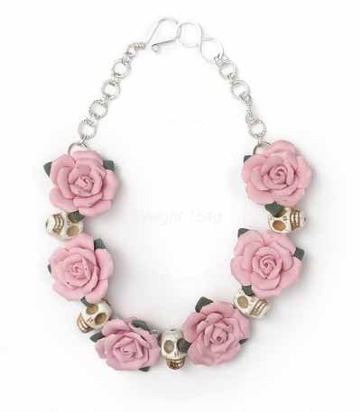 Pink ceramic Roses and Faux Skulls Necklace on a Silver Plate Chain