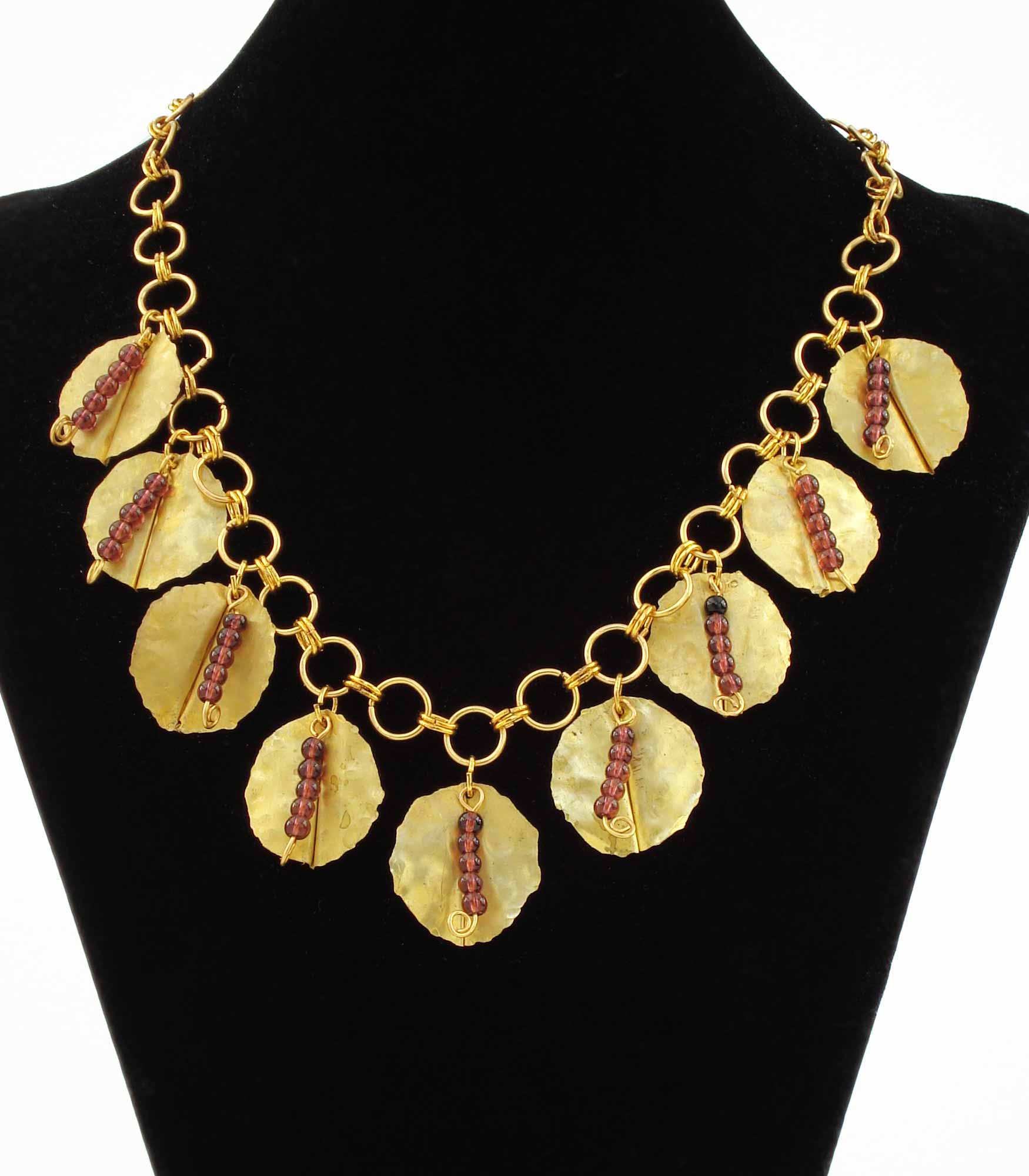 Garnet Bead Strings And Burnished Brass Medalions Necklace