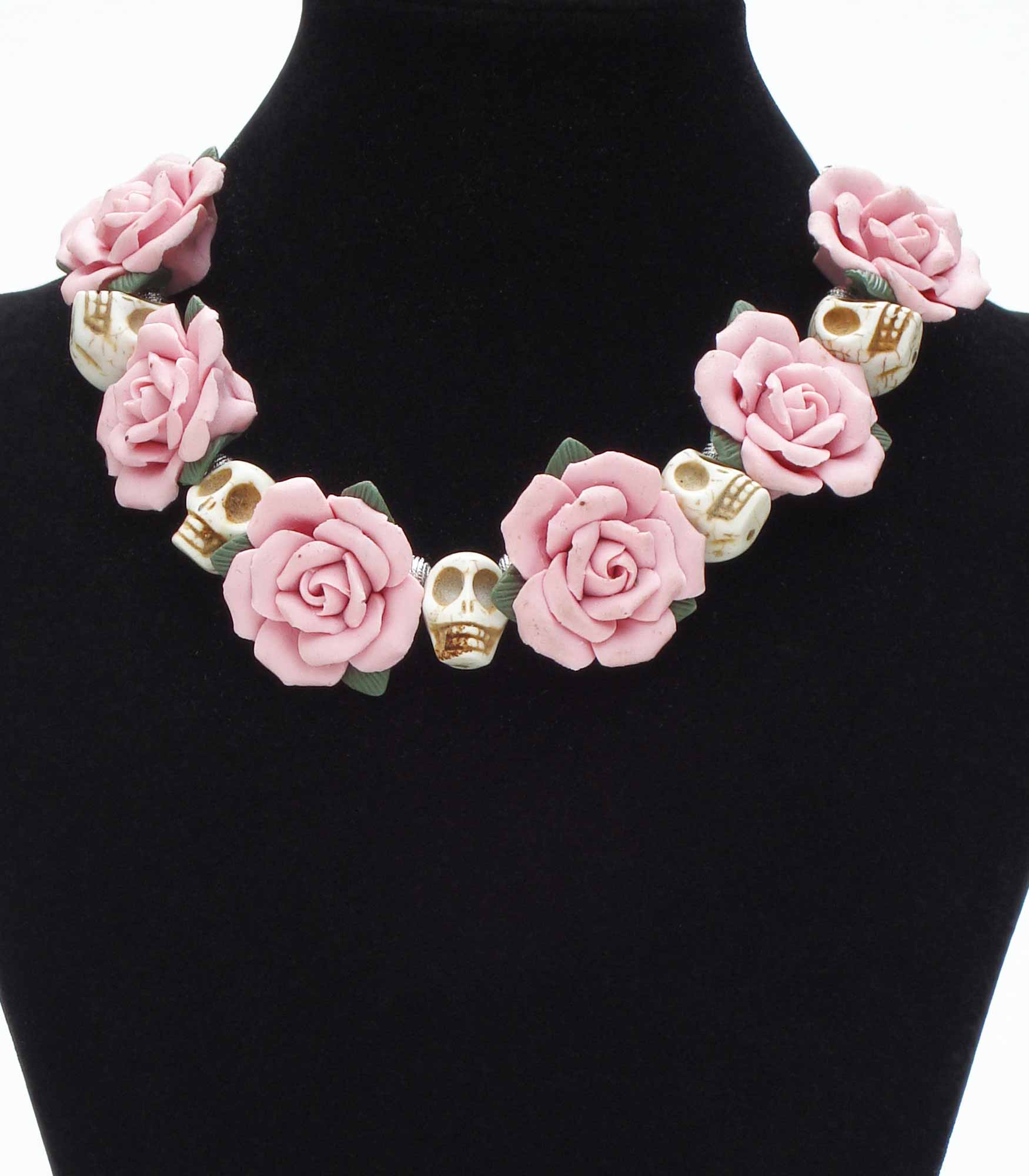 
Pink Ceramic Rose And Ivory Resin Skulls Necklace